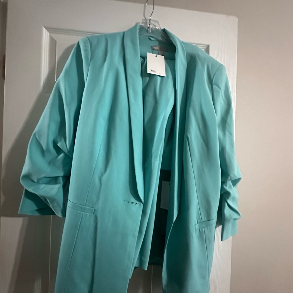 Suits don’t have to be boring.  Used once ..